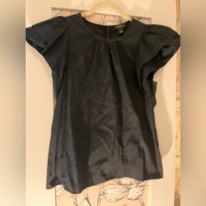 Ruffled sleeveless top